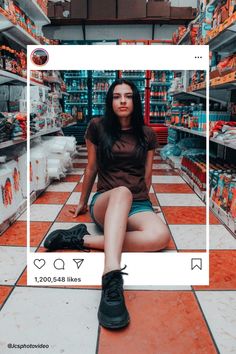 a woman is sitting on the floor in a grocery store with orange and white tiles