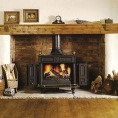 a wood burning stove sitting inside of a living room