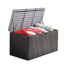 an open storage box with clothes in it