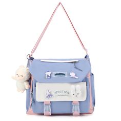 PRICES MAY VARY. 【HIGH QUALITY MATERIAL】 The kawaii shoulder bag is made of high-quality nylon fabric, which is wear-resistant and good in texture, durable to use. 【LARGE CAPACITY】 Size:12.6x11x4.3in. The storage space of this kawaii messenger bag is big enough for your daily belongings. You can easily take your iPad, cell phone, book, wallet, makeup, etc. with you. 【KAWAII ACCESSORIES】Comes with kawaii pins and stuffed pendant. You can also DIY the cute crossbody bag with other kawaii accessori Cheap Light Blue Satchel For Travel, Affordable Light Blue Travel Satchel, Cheap Light Blue Bags With Multiple Compartments, Aesthetic Messenger Bag, Kawaii Pins, Messenger Bags For School, Kawaii Bags, Cute Crossbody Bags, Book Wallet