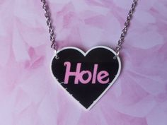 ♥Hole Necklace ♥ This is a fab gift for any fan of the band Hole  Details  ● This amazing Necklace is made on printed white acrylic. ● Hole Charm Measures at around  4cm x 3.5 cm ● Will come on a 18inch Silver Tone Chain (Nickel Free) unless requested otherwise ● Fancy a change!? Longer/Shorter Chain or how about a Different Colour Chain?  Items can be completely customised please contact me to discuss your ideas!  Did You Know?  ● You can contact me for your own customised necklace ● All Items Hole Band, The Face Magazine, Grunge Music, Courtney Love, Inspired Necklace, Alice In Chains, Personalized Pendant, Cameo Necklace, Dream Style