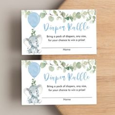 two baby shower gift tags with an elephant and blue balloon on the front one is for diaper raffle