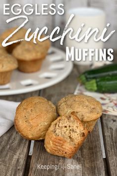 eggless zucchini muffins on a plate with the title overlay