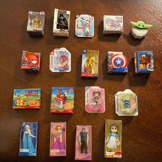 there are many different toy cards on the table with each child's favorite character