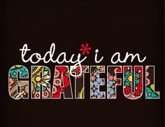 the words today i am grateful written in colorful letters on black paper with red border