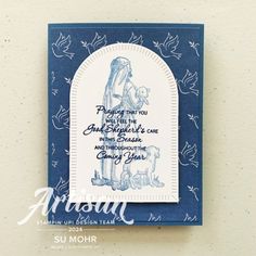 a blue and white greeting card with an image of the nativity scene on it