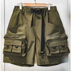 Our 9 POCKETS AMEKAJI CARGO SHORTS are designed for maximum comfort and convenience. This military-style short features utility-enhancing nine pockets and is made using durable, functional fabrics. These shorts feature belt buckle locks, webbing, and Velcro for added durability and attractiveness. With a short, wide version for improved matching and casual comfort, these stylish shorts will fit all your needs. Washing Instructions A washing machine can be used, do not dry in the sun to cause dis Suits For Short Men, Y2k Sweatpants, Military Shorts, Suit Shorts, Streetwear Pants, Salopette Jeans, Mens Shorts Summer, Work Suits, Outdoor Summer