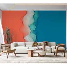 a living room filled with furniture and walls painted in different shades of blue, orange, and white