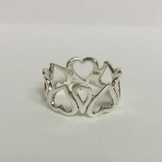 "Thanks for shopping our vintage estate store. We tend to sell well below wholesale and truly hope you enjoy all of our items. Many of the items are one of a kind, so please enjoy scrolling through the pictures and hopefully something will catch your eye. Brown spots are from the reflections. Estate nice sterling silver 925 heart to heart ring. Custom made item for our shop. Ring size: please select size Setting: 3/8\" 8mm Band width: 8mm 3/8\" Weight: 2.85 grams Beautiful ring, one of a kind. S Sterling Silver Heart Ring For Birthday And Valentine's Day, Vintage Silver Heart Ring For Valentine's Day, Silver Heart Shaped Ring For Birthday, Vintage Sterling Silver Heart Ring For Valentine's Day, Vintage Sterling Silver Heart Ring Gift, Stamped 925 Heart Ring For Anniversary On Valentine's Day, Vintage Silver Heart Ring For Gift, Vintage Heart Ring Stamped 925 For Valentine's Day, Valentine's Day Anniversary Heart Ring Stamped 925