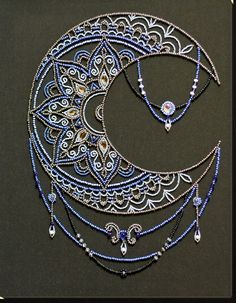 an intricately designed necklace and earring are displayed on a black surface with a circular design in the middle