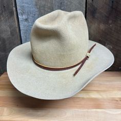 Size: 7 1/4 Tan Leather Hatband With Stag Closure 3 1/4 Inch Brim Replaced Sweatband Vintage Beige Hat Bands For Country Events, Classic Flat Crown Hat Bands For Western-themed Events, Classic Flat Crown Hat Bands For Western Events, Vintage Beige Hat Bands For Rodeo, Classic Adjustable Hat Bands For Western-themed Events, Western Beige Hat Bands For Outdoor, Beige Western Hat Bands For Outdoor, Western Beige Hat Band For Outdoor, Beige Western Hat Band For Outdoor