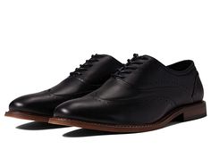 Stacy Adams Macarthur Wing Tip Oxford - Men's Shoes : Black : Slip on excellence and top notch styling, wearing the Stacy Adams Macarthur Wing Tip Oxford. Slip on style with lace up styling. Cushioned footbed for all day comfort. Sturdy and rugged outsole. Durable construction for lasting use. Leather upper. Textile lining and insole. Synthetic sole. Imported. Measurements: Weight: 15.3 oz Product measurements were taken using size 9, width M. Please note that measurements may vary by size. Modern Black Wingtip Lace-up Shoes, Luxury Black Wingtip Oxfords, Black Leather Slip-on Oxfords, Masculine Leather Slip-on Oxfords, Luxury Black Leather-lined Oxfords, Heeled Rain Boots, Black Slip On, High Heel Rain Boots, Mens Shoes Black