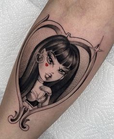 a woman's leg with a tattoo on it