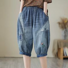 Details: Gender: Women Item Type: shorts Material: Cotton Season: Summer Pattern: Embroidery Style: Casual, Loose, Retro Waist Type: Elastic Waist Size: M Waist: 64.00 - 96.00 cm/ 25.20 - 37.80 " Length: 64.00 cm/ 25.20 " Hip: 124.00 cm/ 48.82 " Thigh: 72.00 cm/ 28.35 " Bottom: 40.00 cm/ 15.75 " Size: L Waist: 68.00 - 100.00 cm/ 26.77 - 39.37 " Length: 65.00 cm/ 25.59 " Hip: 128.00 cm/ 50.39 " Thigh: 74.00 cm/ 29.13 " Bottom: 42.00 cm/ 16.54 " Size: XL Waist: 72.00 - 104.00 cm/ 28.35 - 40.94 " Length: 66.00 cm/ 25.98 " Hip: 132.00 cm/ 51.97 " Thigh: 76.00 cm/ 29.92 " Bottom: 44.00 cm/ 17.32 " Casual Patchwork Jean Shorts, Casual Patchwork Shorts For Spring, Short Spring Bottoms With Patchwork, Casual Medium Wash Patchwork Shorts, Relaxed Fit Denim Blue Bottoms With Floral Embroidery, Spring Patchwork Denim Blue Shorts, Denim Blue Patchwork Shorts For Spring, Denim Blue Relaxed Fit Bottoms With Floral Embroidery, Denim Blue Bottoms With Floral Embroidery And Relaxed Fit