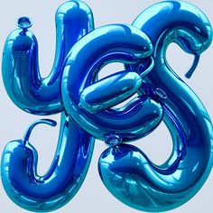 blue balloons shaped like the letter s are floating in the air with an odd shape