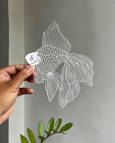 A beautiful and unique papercut design featuring a Goldfish!  All of my templates have been drawn and cut by hand before being digitalized, edited and turned into a cuttable PDF design. Simply download the file after purchase, print out and cut! **All templates are for personal use only - must not be sold** ITEMS INCLUDED 1 x ZIP Folder containing: PDF Files (including 1 flipped and ready to print for hand paper cutters) JPG Files (including 1 flipped and ready to print for hand paper cutters) SVG File Please credit this template at all times. I work hard to create these products and appreciate your support tremendously. Copyright ParthKothekar© TERMS OF USE You may not distribute, share or re-sell the actual file in any way. You may not use the file on any 3rd party printing sites (e.g. Z Papercut Design, Craft Cricut, Fish Craft, Papercut Template, Art Fish, Fish Crafts, Gold Fish, Svg Silhouette, Paper Cut Art