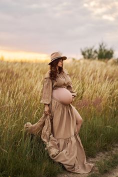 Camel maternity dress for photo session :  - two piece bohemian style gown - ruffled off the shoulder long sleeve crop top  - long maxi skirt with ruffle , it is longer in the back, the skirt has slits on both sides and adjustable waist  This gorgeous boho set is made of very soft, natural gauze material ( 100% cotton ).  All materials used are new and sewed by me. The material is certified by OEKO_TEX Standard 100 and GOTS - meeting all safety standards. SIZE : One size fits most  ( S- XL )  CO Non-stretch Off-shoulder Maxi Dress For Spring, Summer Maternity Dress In Beige, Flowy Maternity Maxi Dress For Fall, Fitted Spring Maternity Dress, Flowy Maxi Dress For Maternity In Fall, Summer Beige Maternity Dress, Fitted Bohemian Maxi Dress For Maternity, Beige Off-shoulder Fitted Maxi Dress, Spring Fitted Maternity Dress