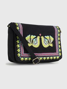 CARINA SLING BAG – BLACKElevate your style with this Black Canvas Embroidered Sling Bag, and experience the fusion of art and fashion like never before. Add it to your cart today and embrace the charm of handcrafted elegance.- Unique Design: The bird motif embroidery reflects the rich cultural heritage of India, giving - you a unique piece of art to wear.- Versatile: This bag effortlessly complements a range of outfits, from bohemian dresses to modern ensembles, making it a versatile accessory f Traditional Black Rectangular Shoulder Bag, Traditional Black Travel Bag, Embroidered Black Satchel Shoulder Bag, Black Embroidered Rectangular Shoulder Bag, Embroidered Black Shoulder Bag For Travel, Multicolor Embroidery Crossbody Shoulder Bag, Black Embroidered Satchel For Daily Use, Black Embroidered Travel Bag, Traditional Black Satchel For Everyday Use