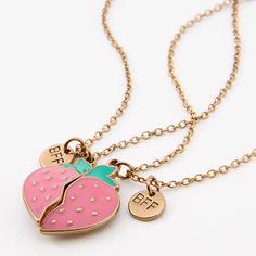 Show off how sweet your friendship is with this strawberry necklace set. The split pendants are adorned with a dainty BFF charm. Finish: Gold-tone Length: 16" + 3" extender Closure: Lobster clasp Pack Size: 2 Material: Metal - Claire's Best Friends Split Strawberry Pendant Necklaces - 2 Pack Friendship Necklaces For 2, Bff Necklaces For 2, Chokers For Kids, Strawberry Necklace, Pusheen Cute, Bff Jewelry, Custom Starbucks Cup, Charm Choker Necklace, Pretty Jewelry Necklaces