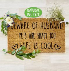 a door mat that says beware of husband pets are shady too wife is cool