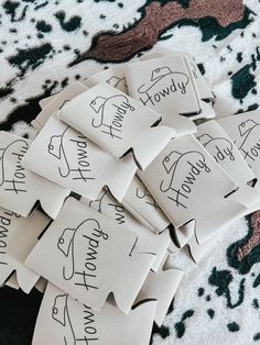 several pieces of paper with writing on them sitting on top of a carpeted floor