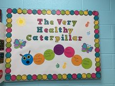 the very healthy caterpillar sign is hanging on the wall in the children's room