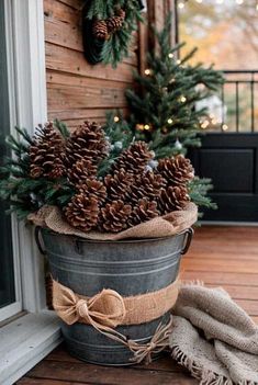 Seeking some snowy inspiration? ❄✨ Dive deep into 21 porch decor ideas that channel winter's magic. Time to craft your snowy sanctuary! Metal Bucket Ideas, Bucket Ideas, Cozy Christmas Decor, Christmas Planters, Country Christmas Decorations, Christmas Porch Decor, Holiday Crafts Christmas, Christmas Porch