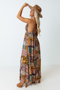 Spend your weekends in style in this stunning maxi dress featuring lightweight material, marigold hued diamond print patchwork patterned with a spotted print, a v-cut neckline, adjustable spaghettis traps, and a relaxed skirt silhouette that cascades into a straight ankle-length hemline! 
     Measurements S variant has  a Bust of 14",  a Hip of 38",  a Length of 53",  a Waist of 26-28".  M variant has  a Bust of 15",  a Hip of 40",  a Length of 53.5",  a Waist of 28-30".  L variant has  a Bust Bohemian Maxi Dress With Floral Patchwork For Beach, Multicolor Maxi Dress With Mixed Print, Bohemian Multicolor Maxi Dress With Mixed Print, Bohemian V-neck Patchwork Maxi Dress, Bohemian Summer Maxi Dress With Mixed Print, Bohemian Maxi Dress With Mixed Print For Summer, Bohemian Mixed Print Maxi Dress For Summer, Bohemian Maxi Dress With Patchwork, Patterned V-neck Sundress Maxi Dress