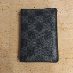 I Am Selling An Authentic Louis Vuitton Damier Graphite Canvas Pocket Organizer/Wallet. Model Number N63143. It Is Hot Stamped With The Initials Mdy. It Is Gently Used, Excellent Condition. It Does Not Come With A Dust Bag, Box, Or Any Accessories. Specs From Lv Website: 3 X 4.4 X 0.4 Inches (Length X Height X Width) Coated Canvas Calf Leather Lining 5 Interior Pockets 1 Exterior Pocket 3 Credit Cards Slots Cowhide Leather Lining The Reference Is Either Made In France, Spain, Italy Or In The Us. Pocket Organizer, Louis Vuitton Accessories, Wallet Organization, Authentic Louis Vuitton, Credit Cards, Cowhide Leather, Louis Vuitton Damier, Made In France, Calf Leather