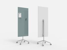 two white and blue standing mirrors with wheels on each side, one has a light switch in the middle