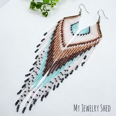 Long Angel Wing Fringe Earrings, Boho Tassel Earrings, Brown and Turquoise, Handwoven Seed Bead, Holiday Earrings, Jewelry Gift for Sister by MyJewelryShed on Etsy Turquoise Fringe Earrings As Gift, Turquoise Fringe Earrings With Round Beads, Turquoise Southwestern Earrings With Beaded Fringe, Turquoise Southwestern Beaded Fringe Earrings, Artisan Turquoise Beaded Fringe Earrings, Turquoise Beaded Fringe Jewelry Gift, Southwestern Turquoise Beaded Fringe Earrings, Turquoise Beaded Tassel Earrings For Festival, Southwestern Turquoise Earrings With Beaded Fringe