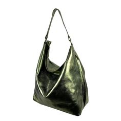 Introducing an Italian leather hobo bag that's as soft as butter! This bag comes with a zip closure and an inner pocket for added convenience. The material used is high-quality leather, and the main closing mechanism is a zipper. The interior of the bag is lined, and it has a large capacity to accommodate all your essentials. Additionally, the bag features a side pocket with a zip closure, making it perfect for storing your phone, wallet, or keys. The measurements of the bag are 48 x 15 x 34 cm, and it has a flat base. This bag is made in Italy and comes with a comfortable handle that can be used for shoulder or hand carrying. Get this Italian leather hobo bag today and make a statement with your style! Leather Hobo Bags, Paper Candle, Writing Accessories, Hobo Bags, Leather Hobo Bag, Bag Dress, Phone Wallet, Leather Hobo, Organic Baby