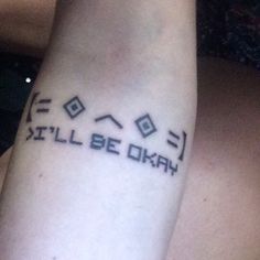 a person with a tattoo on their arm that says, i'll be okay