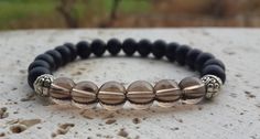 Men's Genuine Matte ONYX & Smokey QUARTZ by Braceletshomme on @Etsy $26.00 #jewelryonetsy #fashion #handmade #etsyAAA #etsymntt #etsyfinds #giftideas #like2 #handcraft #forhim Adjustable Black Bracelets For Anniversary, Personalized Black Round Beaded Bracelets, Personalized Round Black Beaded Bracelets, Personalized Black Round Beaded Bracelet, Hypoallergenic Black Bracelet As Gift, Adjustable Black Beaded Bracelet For Anniversary, Bracelet For Man, Mens Gadgets, Anniversary Gift For Him