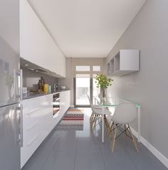 the kitchen is clean and ready to be used as a dining room or office space