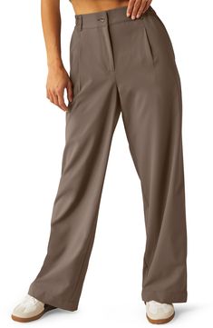 A stretchy waistband keeps you moving comfortably in these wide-leg trousers made with plenty of pockets to store your essentials. 30 1/2" inseam; 22" leg opening; 12 1/2" front rise; 16" back rise (size Medium) Zip fly with button closure; back elastic waist Side-seam pockets; back welt pocket 100% polyester Machine wash, tumble dry Imported Wide Leg Pants With 4-way Stretch And Side Pockets, 4-way Stretch Wide-leg Pants With Pockets, Wide-leg Pants With Pockets And 4-way Stretch, Yoga Status, Capsule Wardrobe Outfits, Fashion Capsule Wardrobe, Chic Sneakers, Preppy Chic, Denim Chic