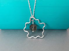 🌟Get VIP status to enjoy 15% off your order, visit- VIP.JewelleryByJackie.com 🌟 Transform your jewellery collection with our one-of-a-kind sterling silver smokey quartz splodge necklace, featuring an aesthetically unique handmade wavy hoop pendant.  This versatile piece effortlessly harmonizes with your style, whether you're embracing a casual look, making a powerful statement in the office, or stepping out for a glamorous evening. The asymmetrical gemstone pendant adds a modern touch, making it the perfect accessory to elevate your entire wardrobe.  Embrace the beauty of artisan jewellery and make a statement with this sustainable necklace. 📏Approx. Measurements: Rope Chain length: 18 inches (45.7cm) Rope Chain width: 1mm Pendant Widest: 22mm Pendant length: 25mm Smoky Quartz: 7mm 💎Ge Handmade Smoky Quartz Jewelry For Gifts, Handmade Smoky Quartz Jewelry Gift, Smoky Quartz Pendant Necklace Gift, Smoky Quartz Pendant Necklace For Gift, Smoky Quartz Necklace, Brown Gemstone, Personalized Rings, Smokey Quartz, Quartz Necklace