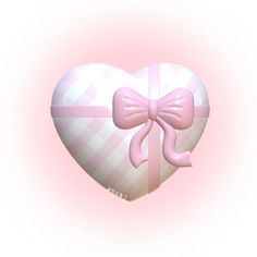 a heart shaped box with a pink bow on it's side, in the shape of a heart