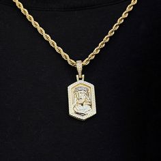 Introducing the Icon Jesus Pendant, an 18K Gold Plated statement piece featuring imagery of Jesus with a CZ stone halo. The pendant is framed with cuban links and features an iced out bail with CZ stones. This stand out piece is a must have and pairs perfectly with our 4mm Rope Necklace. This product is guaranteed for life - GLD will repair the item should you experience any defects in craftsmanship or breakage. Specifications - .7" x 1.2" (Width x Height) - Weight: (Weight can vary +/- .5 grams