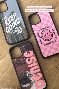 two iphone cases with the words keep going and an image of a smiling face on them