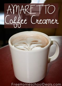 there is a cup of coffee with cream in it and the words amarretto coffee cremer above it