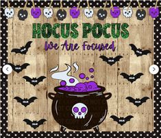 a wooden sign that says hoccus pocus we are found with skulls on it