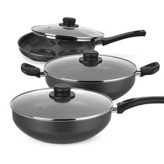 three pots and pans on a white background