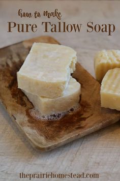 soap bars on a wooden cutting board with the words how to make pure tallow soap