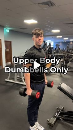 a man holding two dumbs in a gym with the words upper body dumbbells only