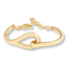 Bellezza Bronze Polished Equestrian Bangle Bracelet Elongated, wishbone-inspired swerves and curves make this bangle a sleek and modern standalone style that also looks great layered with other bracelets.        Approx. 6-1/2"L x 7/8"W with 1-1/2" extender; fits 6-1/2" to 7-3/4" wrist      Bronze; goldtone; polished finish      Chain-link extender: lobster-claw clasp Adjustable Modern Twist Bangle, Modern Twist Bangle For Formal Occasions, Jewelry Techniques, Wedding Watch, Hair Fragrance, Men's Grooming, Bangle Bracelet, Lobster Claw, Chain Link