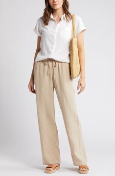 These lightweight linen pants are cut with straight legs and topped with a comfortable elastic-drawstring waist. 29 1/2" inseam; 22" leg opening; 11" front rise; 16" back rise (size Medium) Elastic/drawstring waist Front slant pockets; back patch pockets 100% linen Machine wash, line dry Imported Everyday Wide Leg Drawstring Pants, Everyday Wide Leg Pants With Drawstring, Everyday Spring Bottoms With Drawstring, Spring Linen Wide Leg Pants With Drawstring, Beige Linen Pants With Drawstring, Everyday Wide-leg Pants With Drawstring, Relaxed Fit Straight Leg Bottoms With Tie Waist, Straight Leg Bottoms With Tie Waist And Relaxed Fit, Beige Linen Drawstring Pants