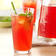 two glasses filled with watermelon and ice