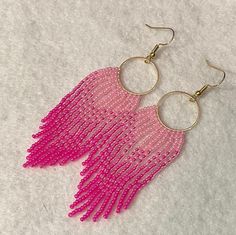 Pink ombré beaded circle fringe earrings.  Materials: -Czech glass seed beads -Nylon string -Gold circle/hoop -18k gold plated hooks Pink Beaded Earrings, Art Selling, Beaded Circle, Selling Ideas, Ombre Earrings, Beaded Fringe Earrings, Earrings Circle, Beaded Earrings Patterns, Pink Beaded