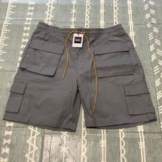 Young And Reckless Cargo Shorts *Nwt* Gray Cargo Shorts For Summer, Casual Yellow Bottoms With Side Pockets, Casual Yellow Bottoms With Cargo Pockets, Gray Utility Bottoms For Summer, Summer Utility Gray Bottoms, Summer Gray Utility Bottoms, Yellow Pocket Shorts For Streetwear, Yellow Shorts With Pockets For Streetwear, Yellow Streetwear Shorts With Pockets